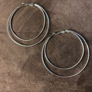 2 pairs of hoop earrings (one larger than the other)